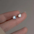 Tiny Round Moonstone Stud Earrings in Sterling Silver